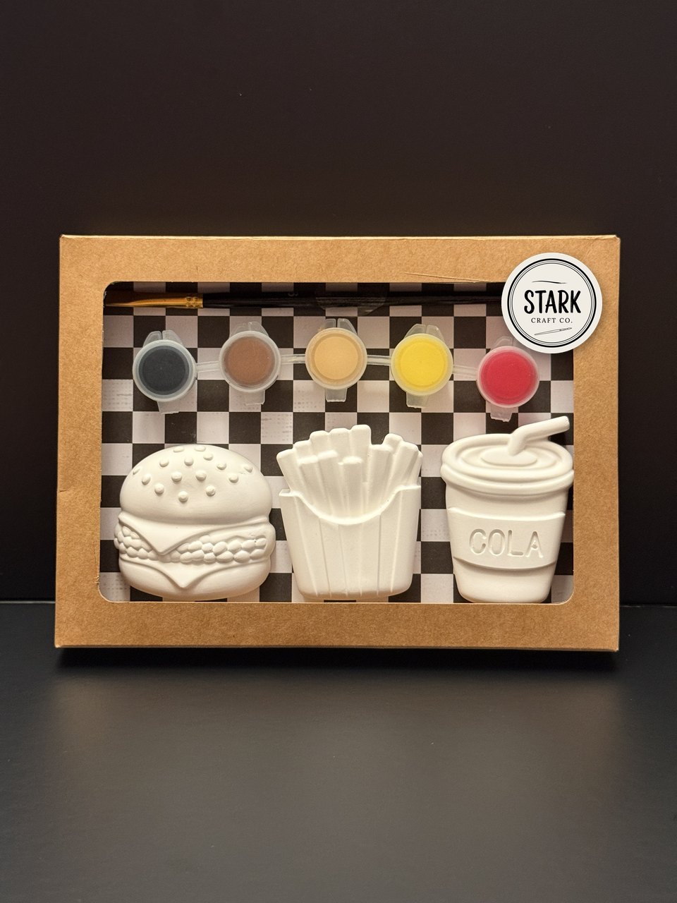 Unpainted fast food kit: burger, fries and cola in a kraft window box with paints